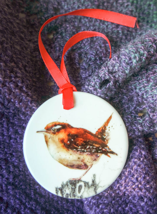 'Little Wren' a beautiful ceramic hanging decoration  with a red ribbon