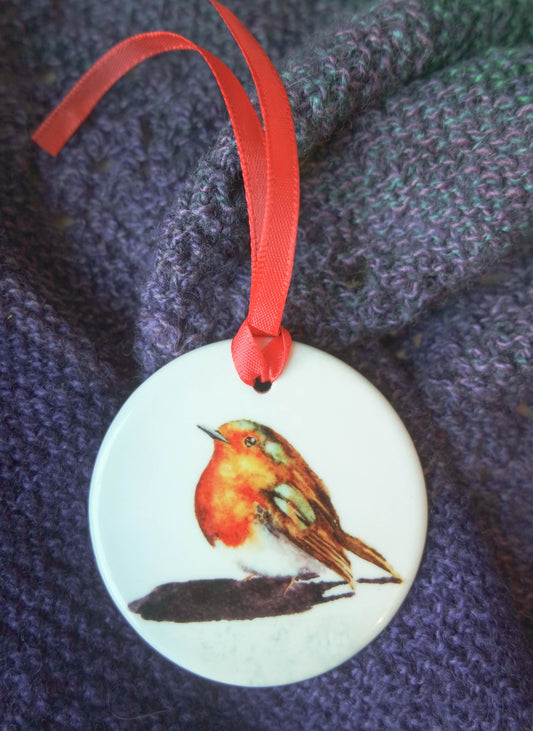 'Little Robin' a beautiful ceramic hanging decoration  with a red ribbon